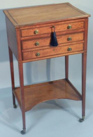 A satinwood and boxwood side table