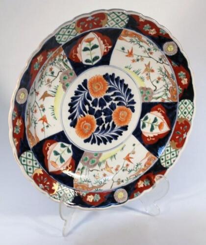 A late 19thC Japanese Imari pottery charger