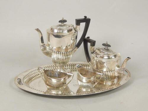 A Mappin & Webb silver four piece tea and coffee service with tray