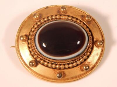 A Victorian onyx set brooch