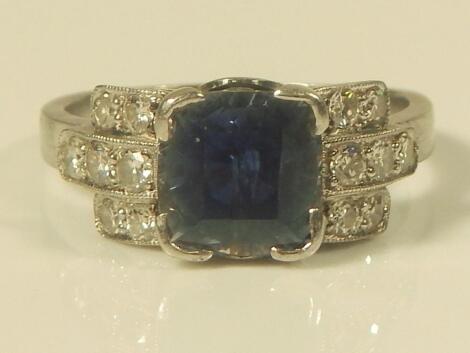 A synthetic sapphire and diamond ring