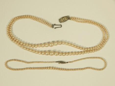 A single and a double row simulated pearl necklace