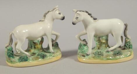 A pair of Staffordshire horses