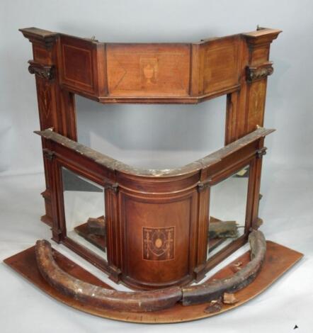 An Edwardian mahogany and marquetry corner fireplace