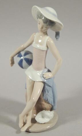 A Lladro porcelain figure of a girl