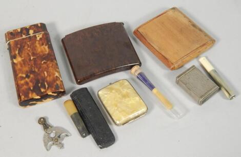 A collection of cigarette and other cases