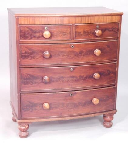 A Victorian figured mahogany bow fronted chest