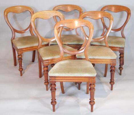 A set of six Victorian balloon back chairs