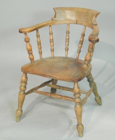 A 19thC ash and elm captain's type chair