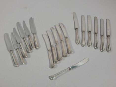 A large quantity of silver handled dessert knives