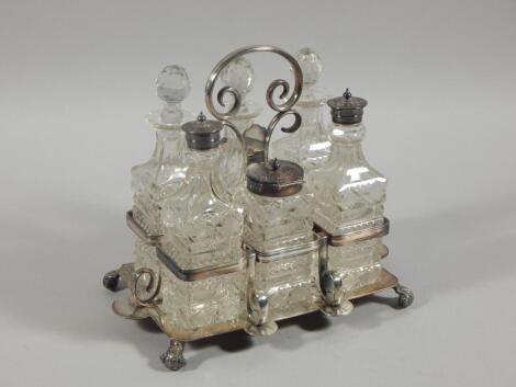 An Edwardian silver plated six bottle cruet