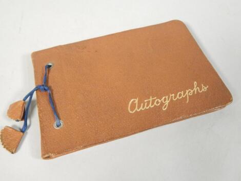 An autograph album containing various signatures