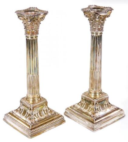 A pair of Victorian silver candlesticks