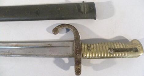 A late 19thC French bayonet and scabbard