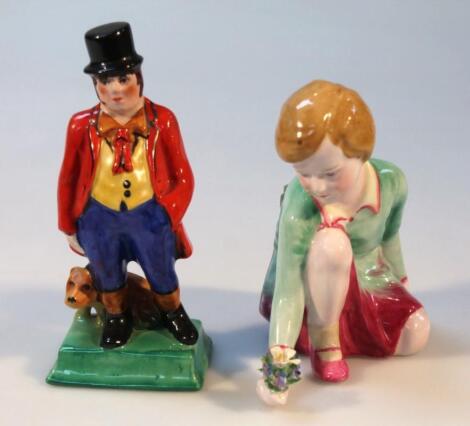 A 20thC pottery figure group