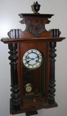 An early 20thC walnut and part ebonised Vienna wall clock