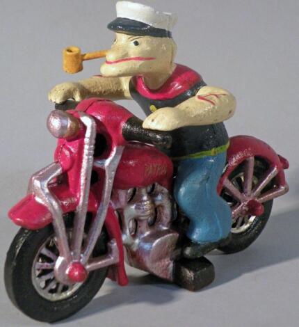 *A Popeye figure on a motorcycle