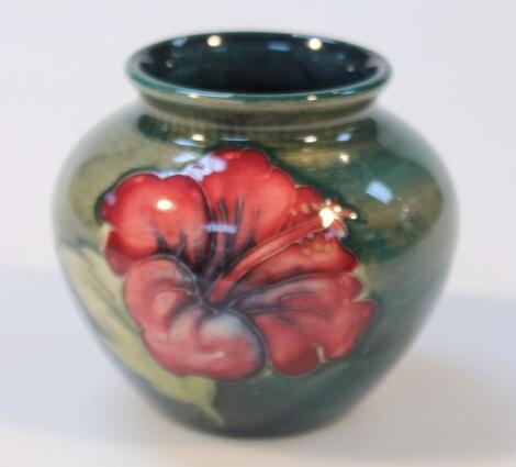 An early 20thC Moorcroft Annemone pattern vase