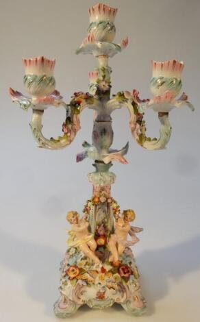 An early 20thC Sitzendorf porcelain four branch candelabra