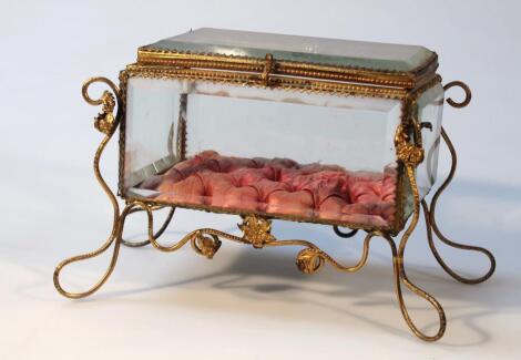 An early 20thC glass and wirework casket