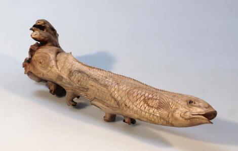 A 20thC carved driftwood piece