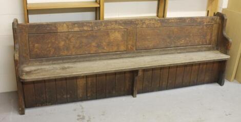 *A late 19thC pine pew