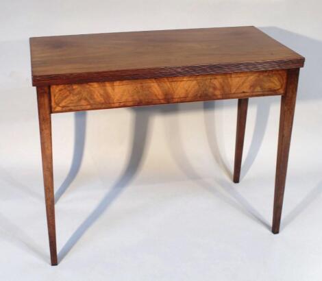 A 19thC mahogany fold over tea table