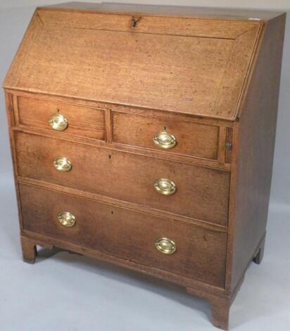 An early 19thC oak bureau