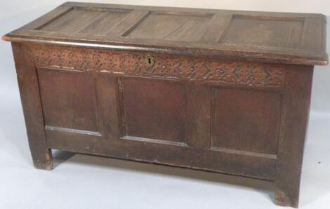 An 18thC oak three panelled coffer