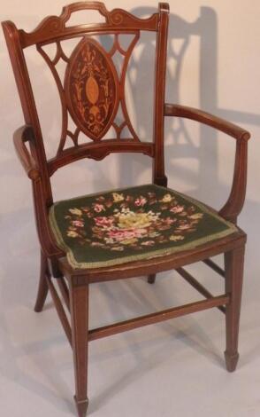 An Edwardian mahogany painted and boxwood strung elbow chair