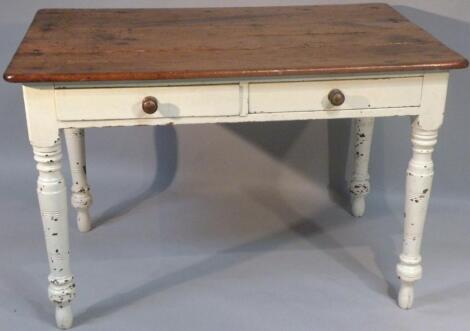 A 19thC pine plank top kitchen table