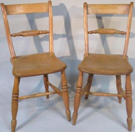 A pair of late 19thC ash and elm kitchen chairs