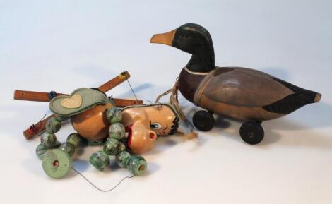 A 20thC folk art style painted wooden mallard