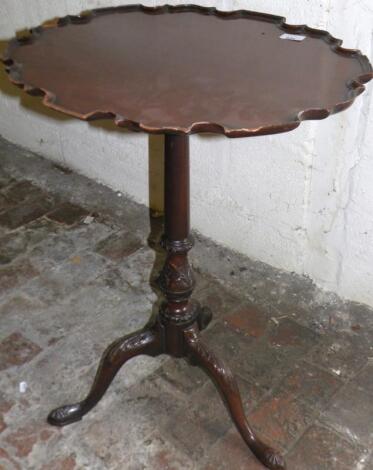 A mahogany Chippendale design pedestal table