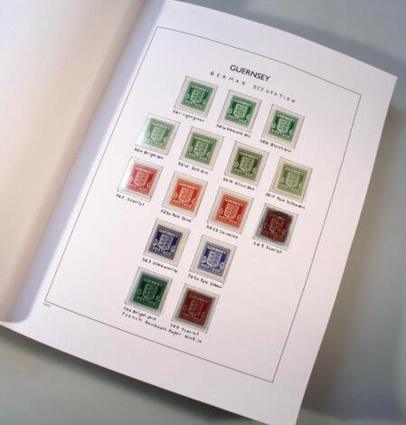 Three Guernsey stamp albums