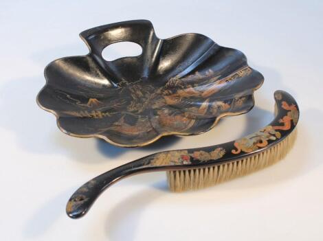 A 20thC Japanese lacquered papier mache brush and pan