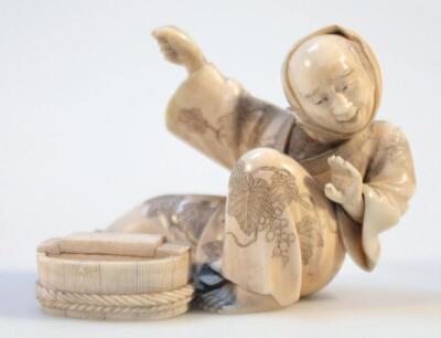 A 19thC Japanese ivory okimono figure