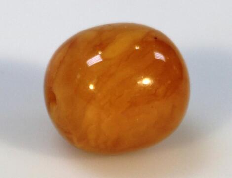 A butterscotch amber bead