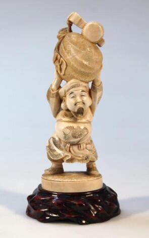 A 19thC Japanese ivory figure