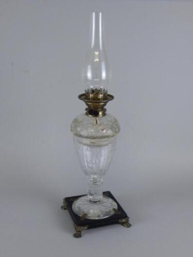 A late 19thC cut glass oil lamp