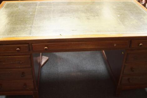 A Victorian style mahogany partner's desk