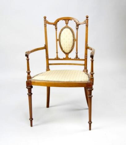 An Edwardian string inlaid mahogany boudoir open armchair