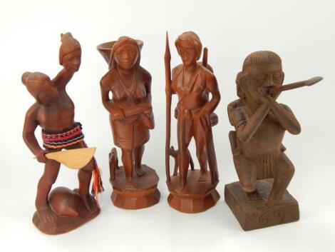 Four tribal style figures