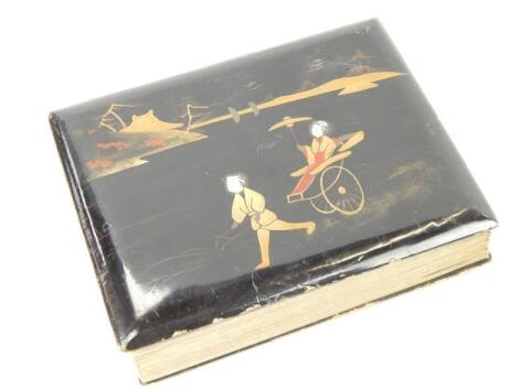 An early 20thC Japanese black lacquered postcard album