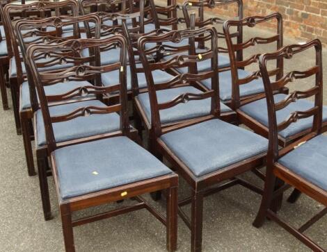 A set of nineteen reproduction Georgian style dining chairs