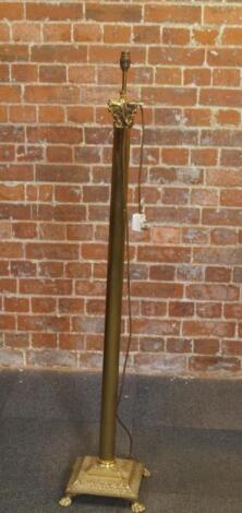 A brass Corinthian column standard lamp.