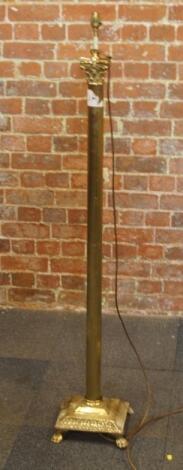 A brass Corinthian column standard lamp.