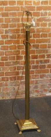 A brass Corinthian column standard lamp.