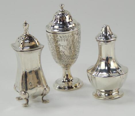 A Victorian silver pepperette and three others