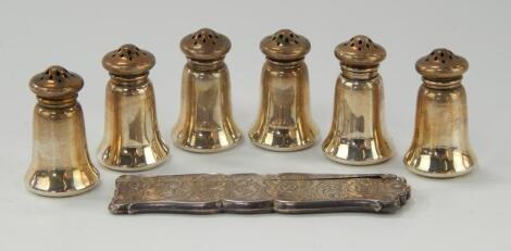 A set of six small plain Sterling silver pepperettes